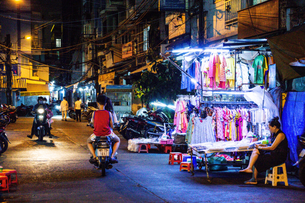 Night time in an alleyway Xom Chieu market 
