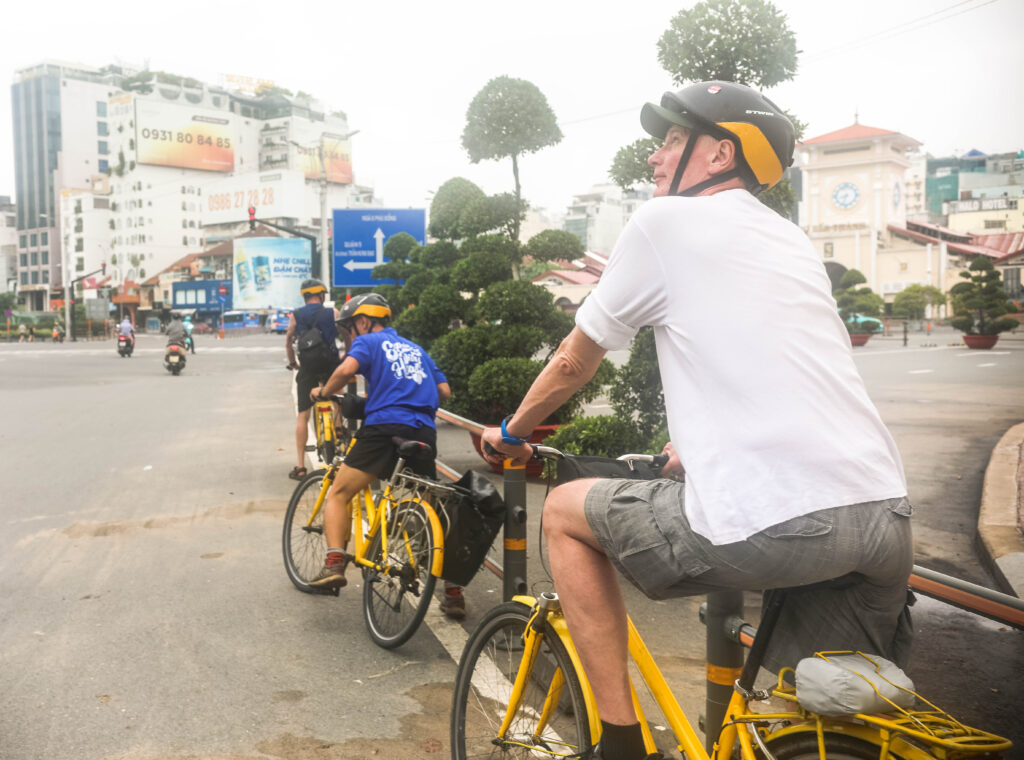 explore saigon train track and phu chau floating temple by cycling