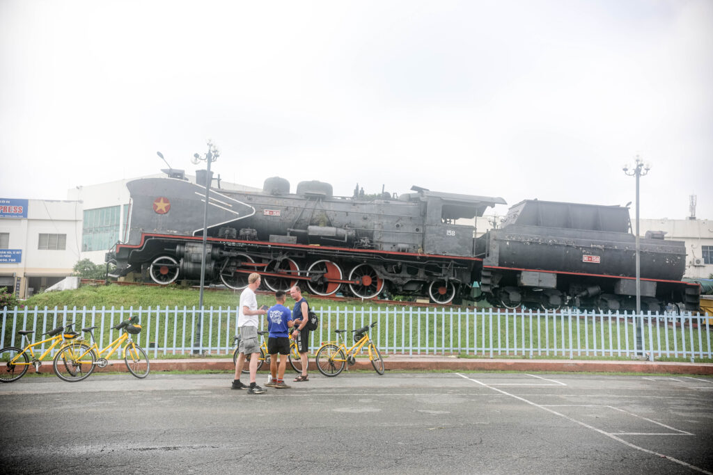 explore saigon train track and phu chau floating temple by cycling