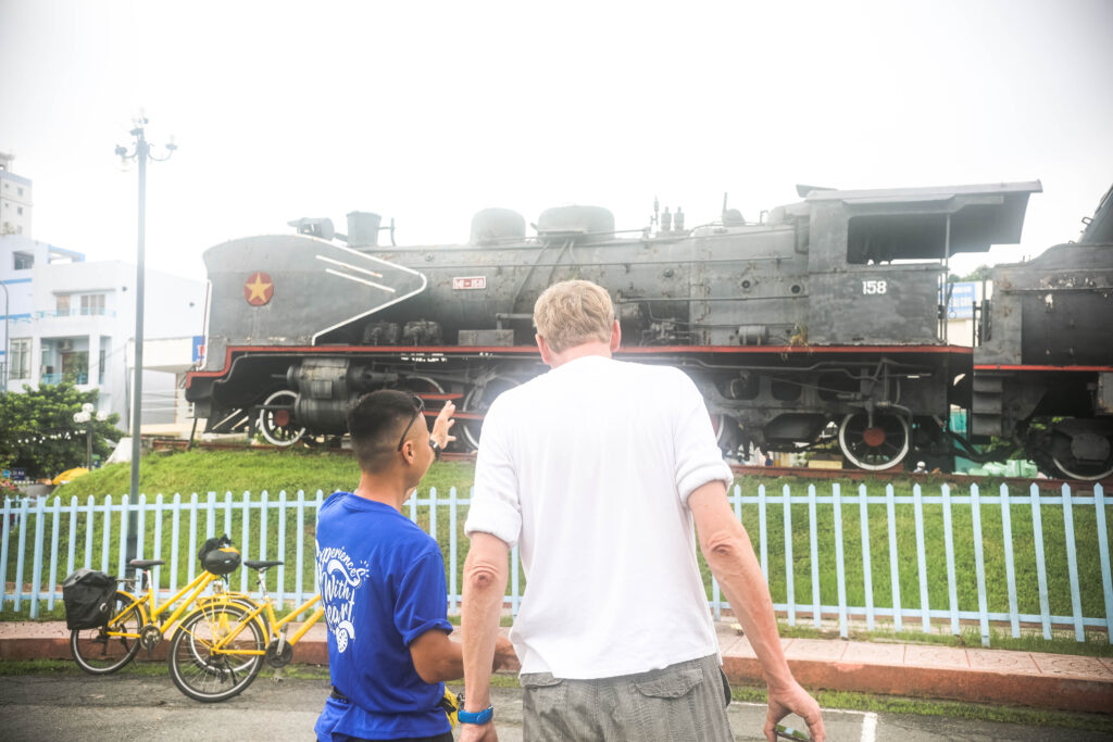 explore saigon train track and phu chau floating temple by cycling