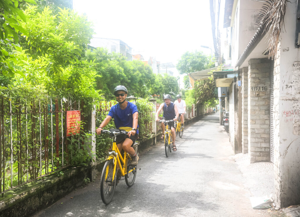 explore saigon train track and phu chau floating temple by cycling