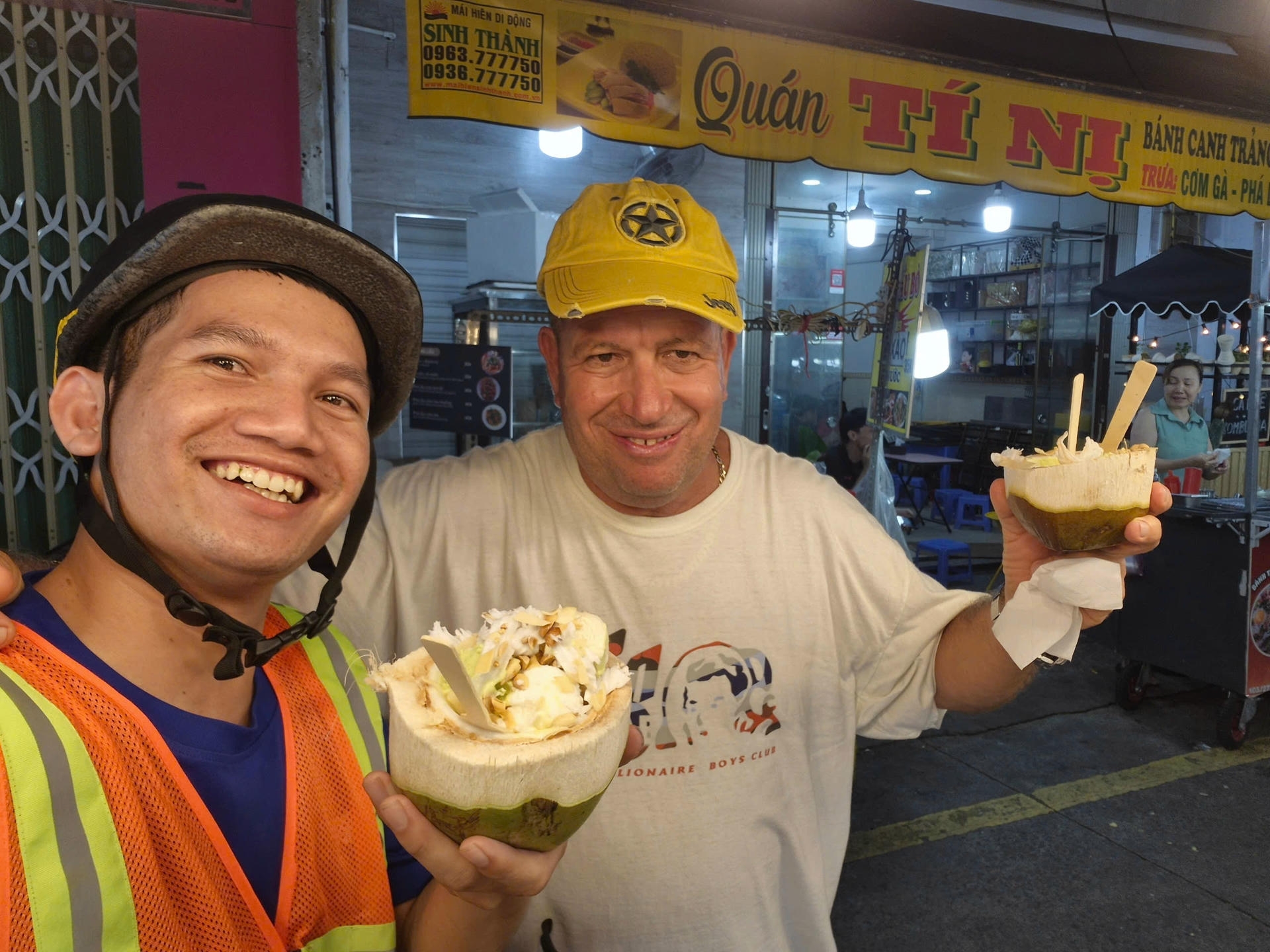 A tourist enjoyed a Vietnamese coconut icecream in Jackfruit Adventure Street Foodie Tour 