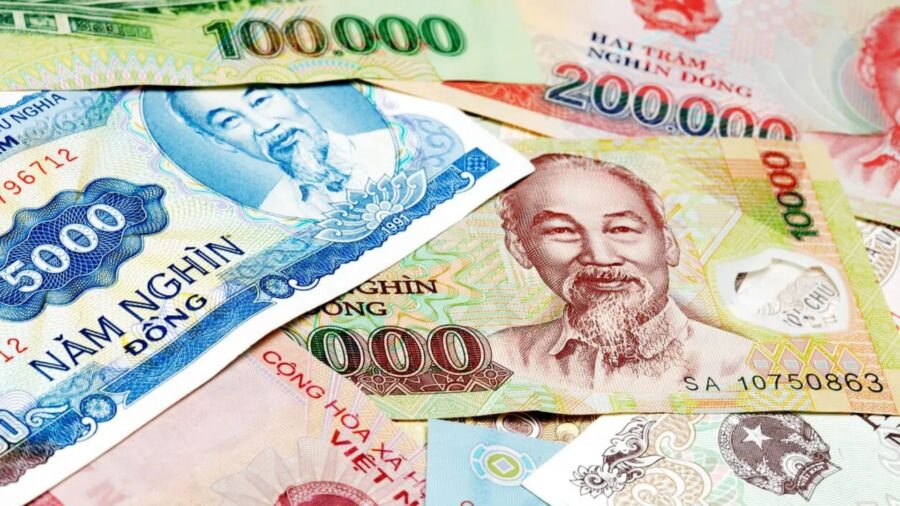 Close-up of a Vietnamese polymer banknote featuring President Ho Chi Minh on the front.