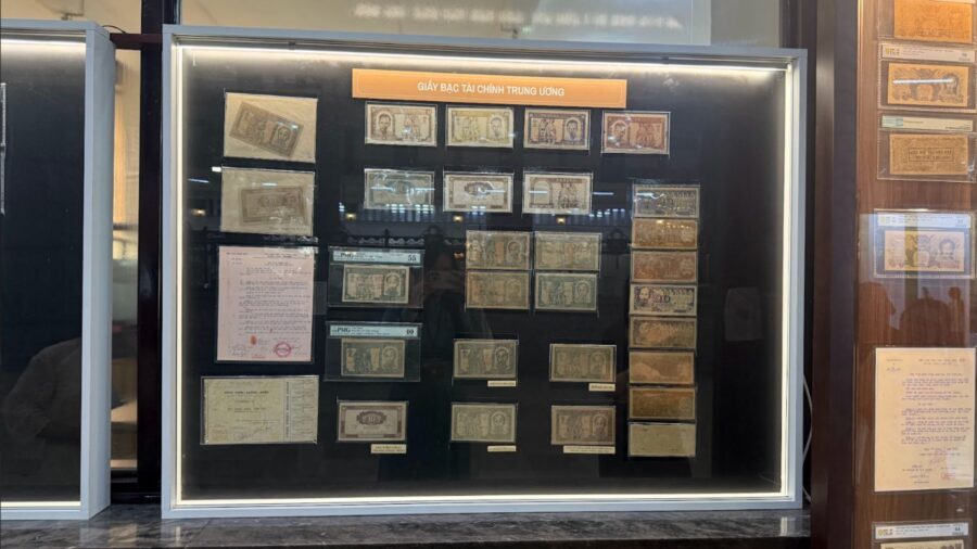 Display case of Vietnamese central financial notes from the 1945-1954 period at the Vietnamese currency exhibition in Ho Chi Minh City.
