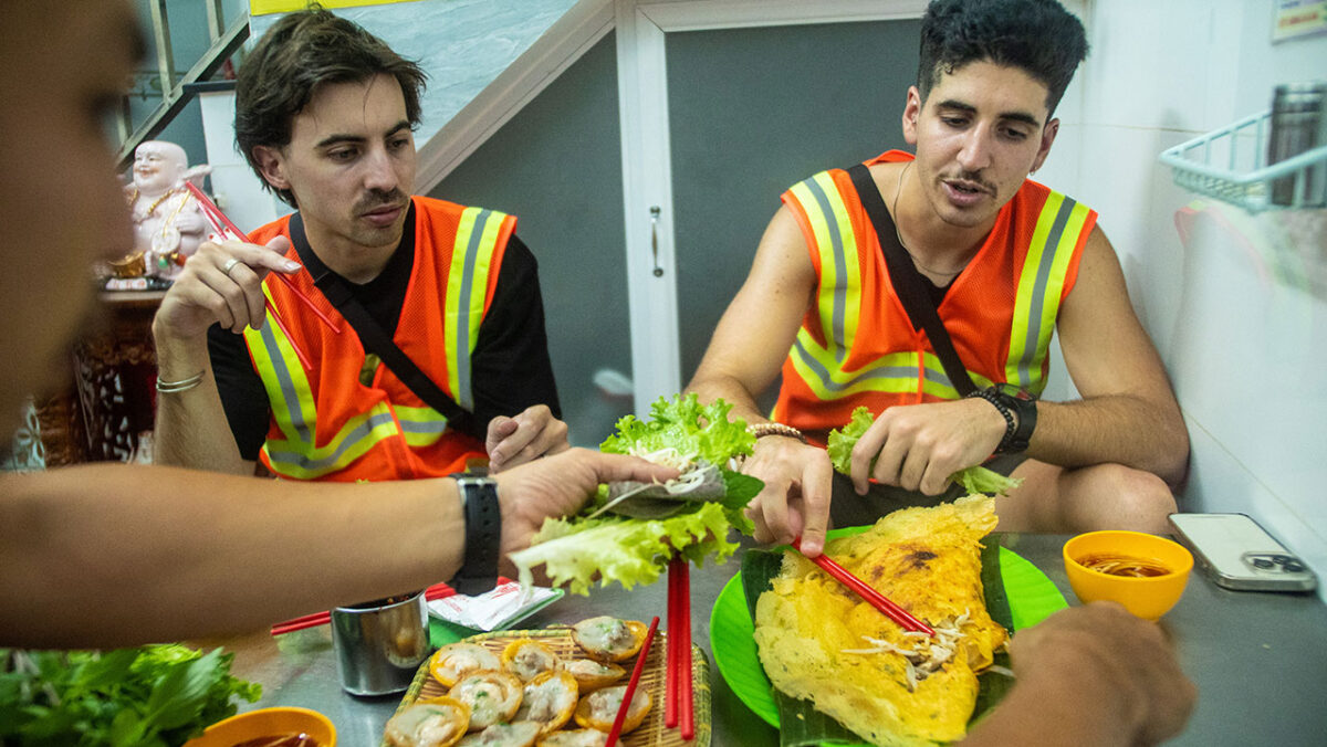 Learn how to eat banh xeo in Saigon - wrapped in rice paper - Jackfruit Adventure