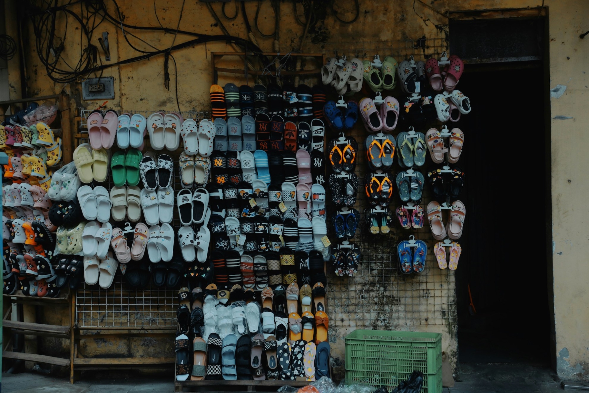 sidewalk shopping - hanoi shoe street - Jackfruit Adventure