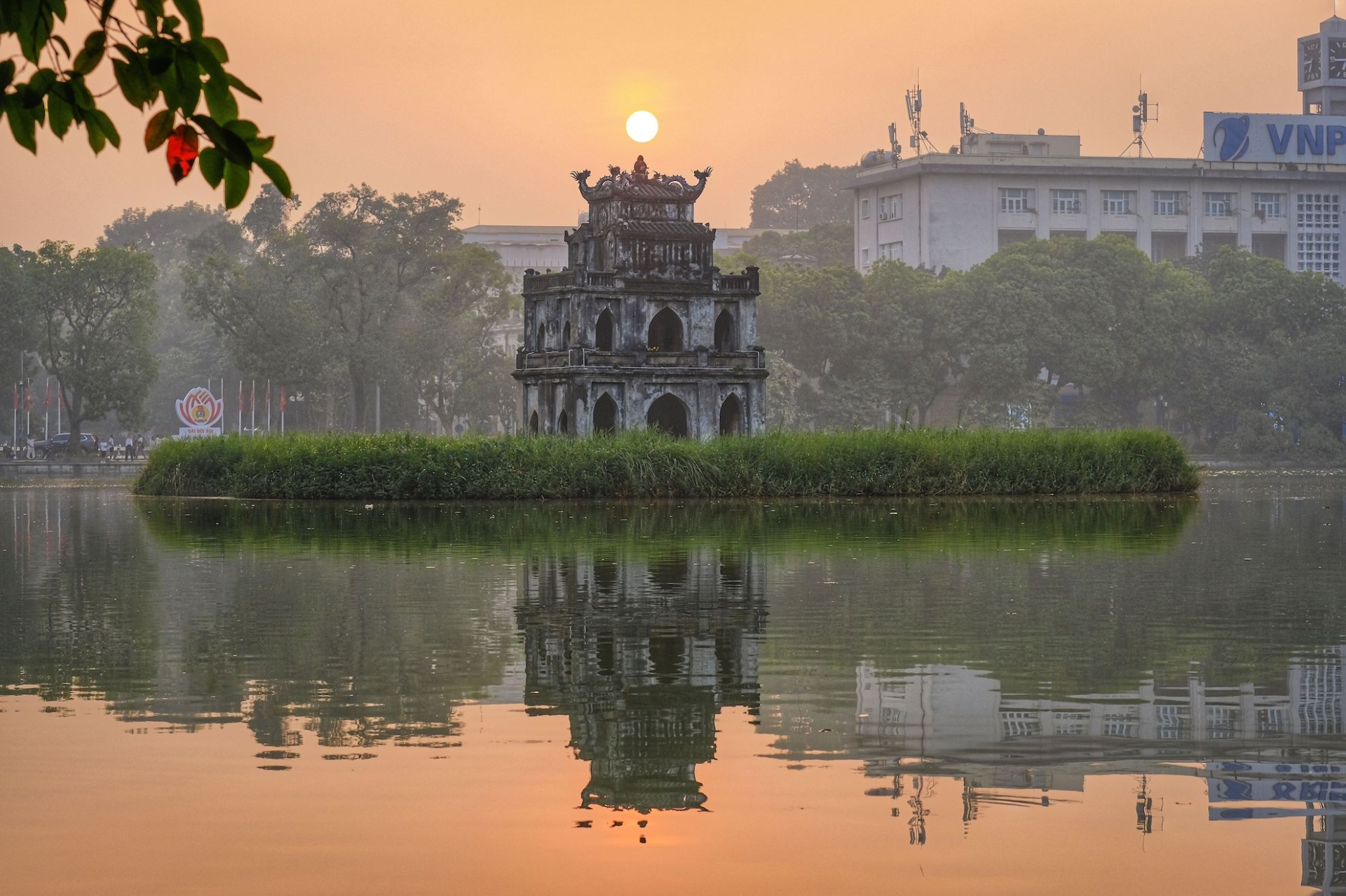 ho hoan kiem sunset - the capital of Vietnam - Jackfruit Adventure