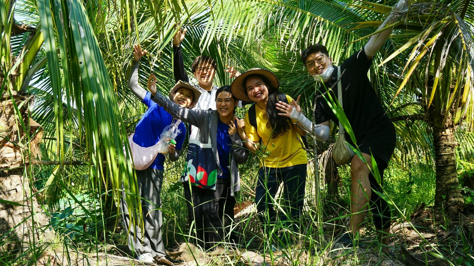 travelers pausing in a lush tropical garden_eco tour_Jackfruit Adventure
